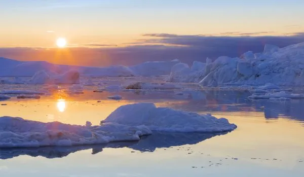 iceberg-and-ice-floe-at-sunset-SBI-300939501